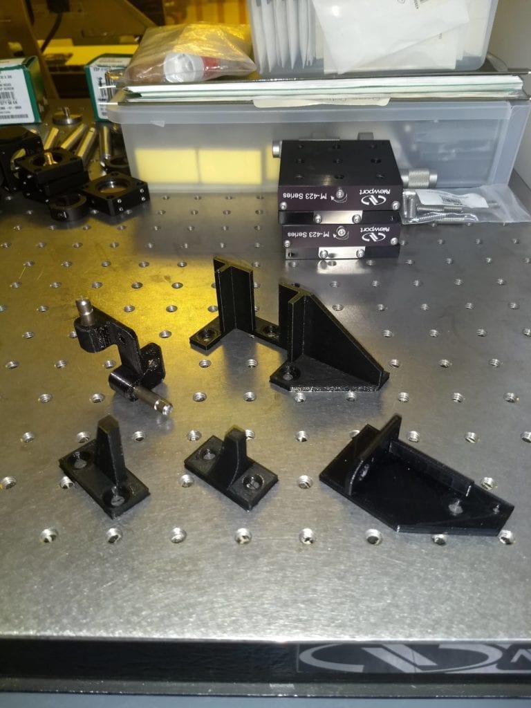 A first iteration of the PLA stage brackets that we printed using the 3D printer in the Clean Room.