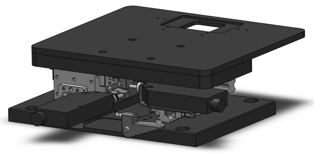 The microscope stage, fitted with PLA brackets used to support and secure the actuators.