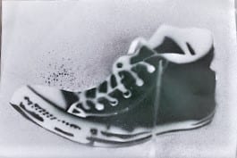 Team logo. A black and white spray-paint shoe stencil designed by Alex Wyman
